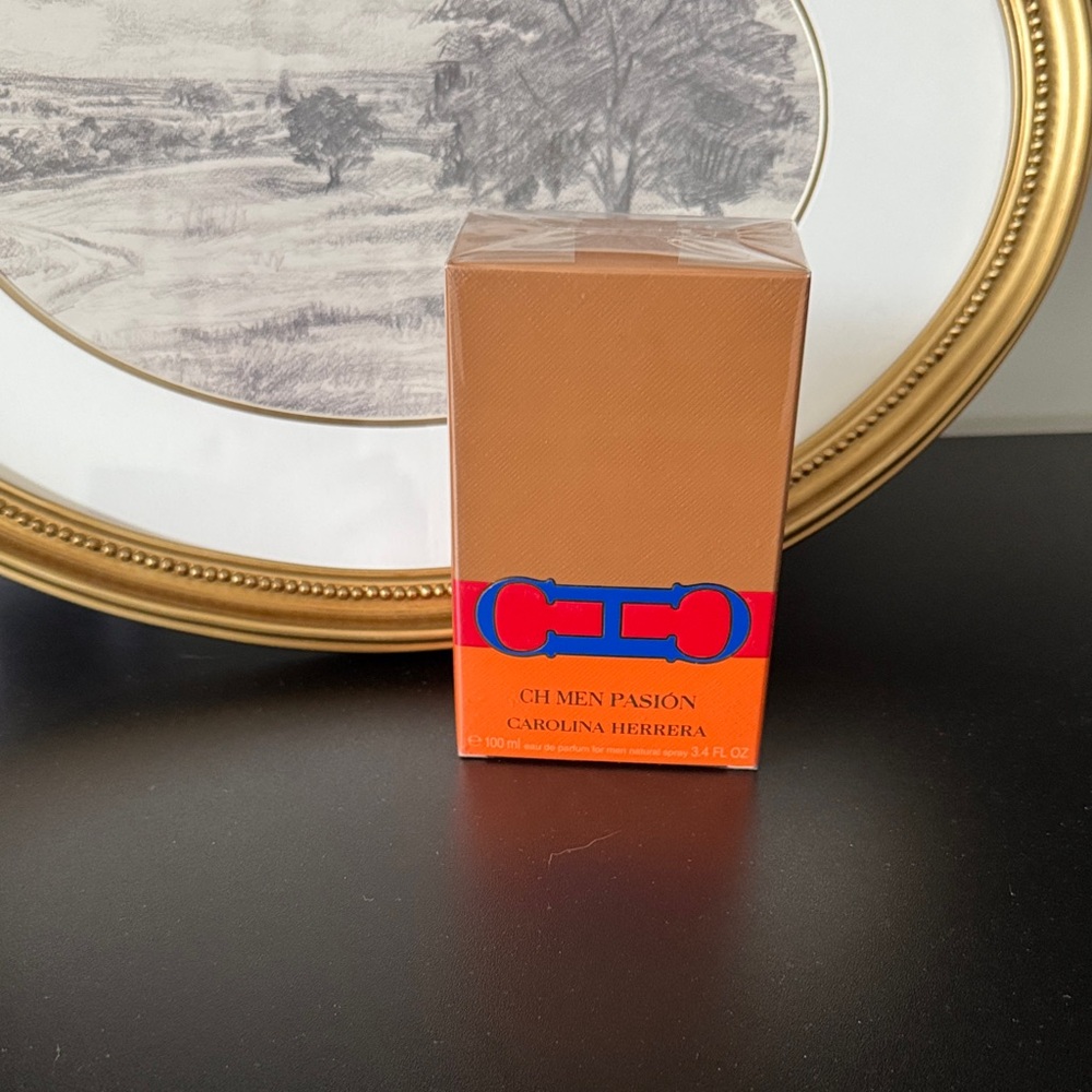 Carolina Herrera CH Men Pasión Eau de Toilette in Orange and Red